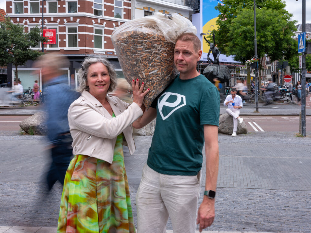 Coordinators Bernadette Hakken (Ms. Cigarette Butt) and Anton Damen (Plandelman)